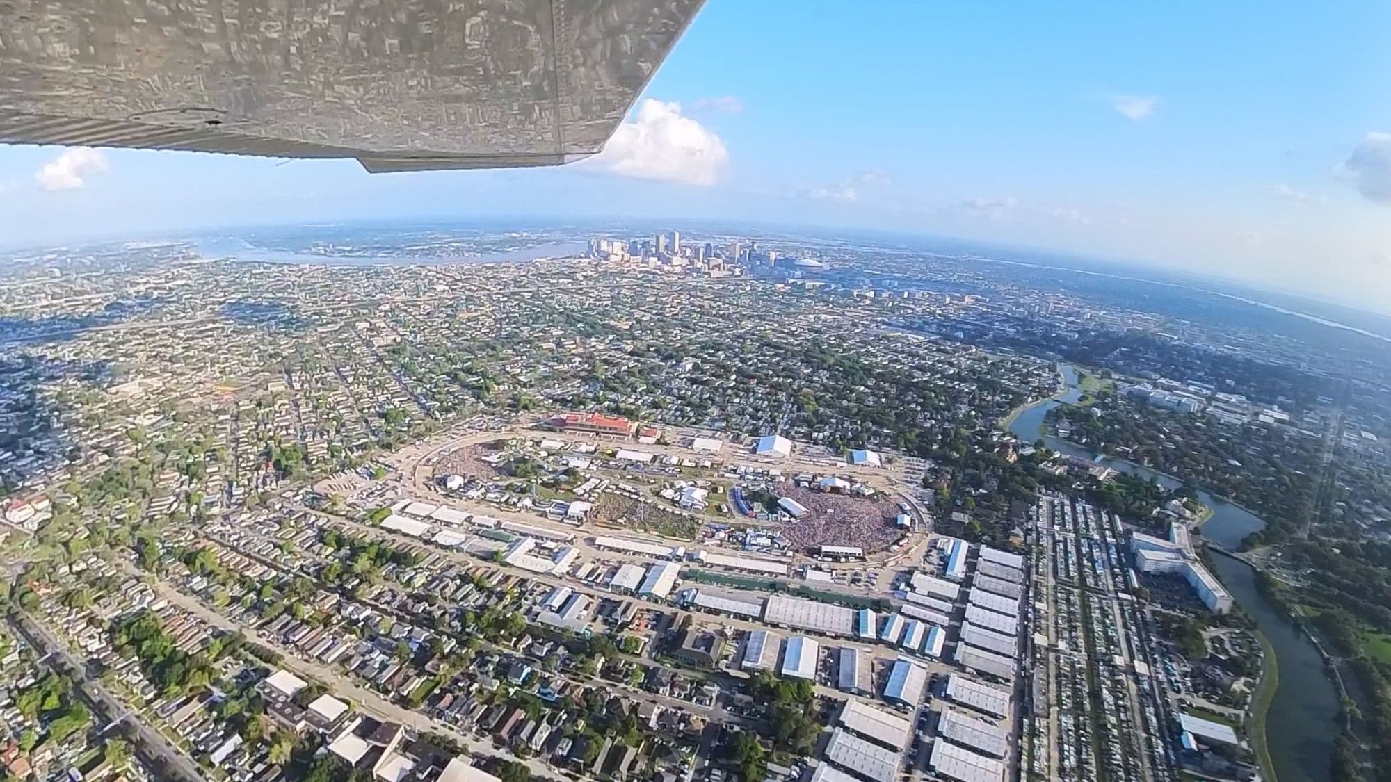 Aerial view from a Pelican Sky flight over the Jazz Fest crowd at the New Orleans Fair Grounds